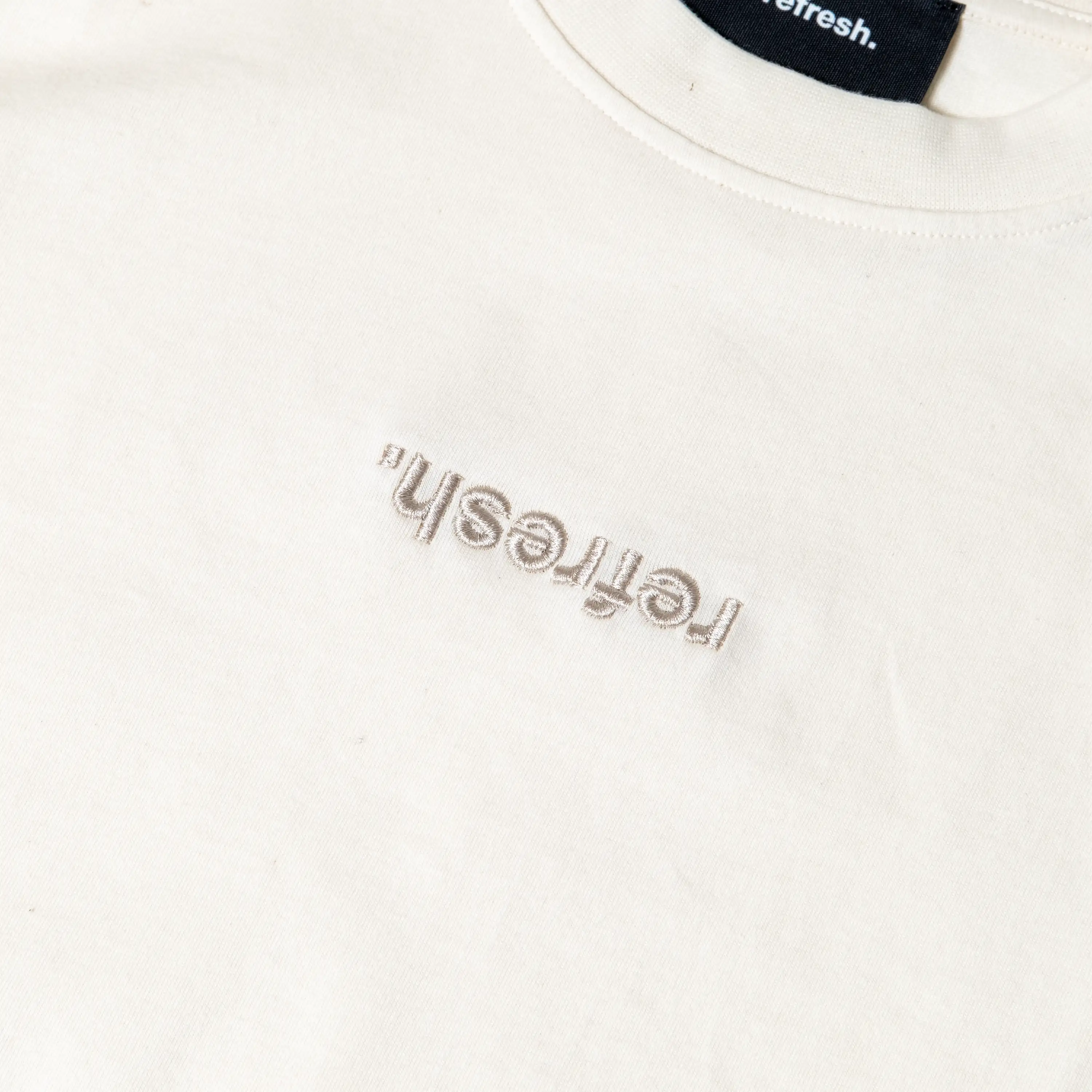 refresh. Reverse Logo Over T-Shirt